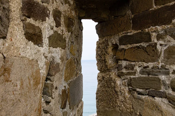 The wall of the old fortress, towers, and structures, the ruins of the old fortress.