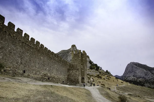 The wall of the old fortress, towers, and structures, the ruins of the old fortress.