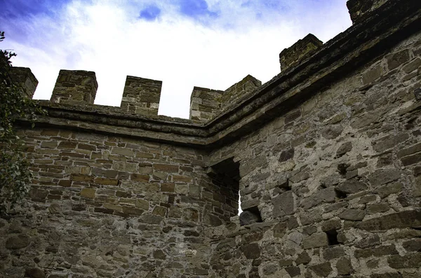 The wall of the old fortress, towers, and structures, the ruins of the old fortress.