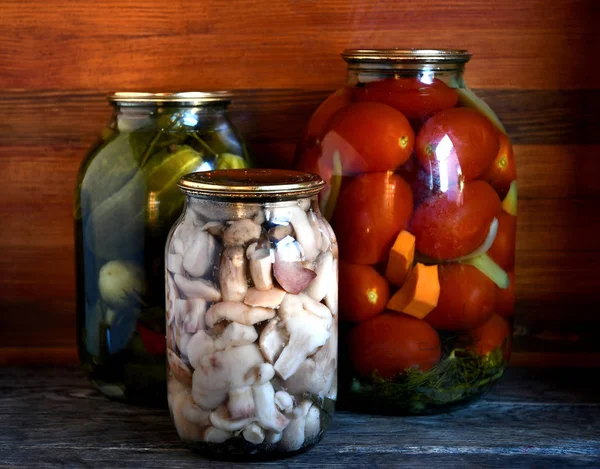 Canning Products Cucumbers Tomatoes Mushrooms Wooden Background Harvesting Storage Products — Stock Photo, Image