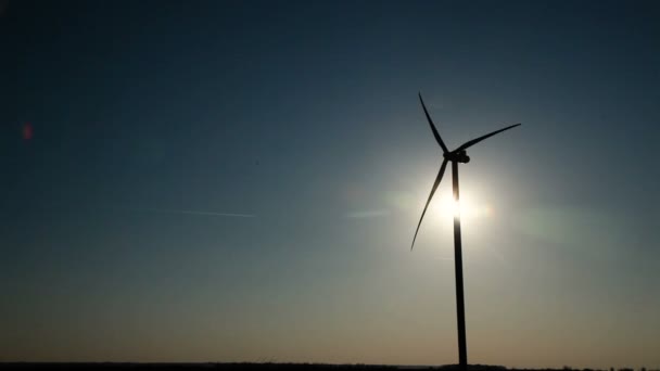 Wind turbine and the sun — Stock Video