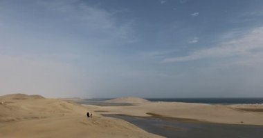 Qatar desert dunes by the sea - Khor Al Udeid, Persian Gulf, Middle East. Desert landscape sand dunes
