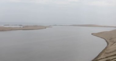 Desert landscape sand dunes near the sea  in Qatar- Khor Al Udeid ,middle east - Arabia
