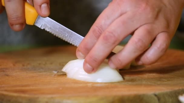 Chopping Onions Wooden Board Slow Motion Female Hands Orange Knife — Stock Video