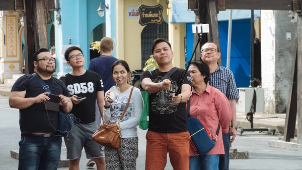 Tourists selfie at the walking street of Phuket town — Stock Photo, Image