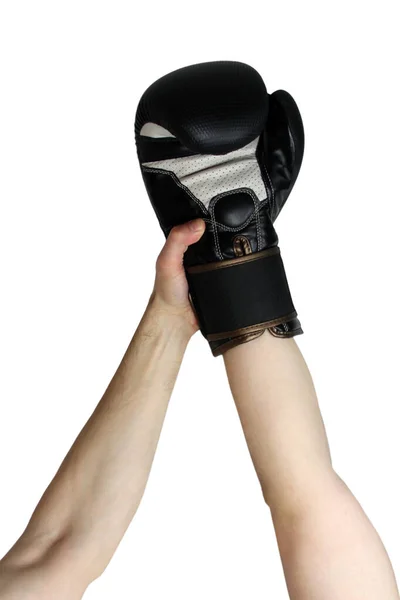 Winner’s boxer hand raised in black boxing glove, closeup, copy space, victory concept — Stock Photo, Image