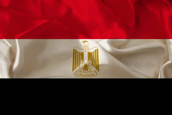 Bella foto della bandiera nazionale colorata dello stato moderno dell'Egitto su tessuto strutturato, concetto di turismo, emigrazione, economia e politica, primo piano — Foto Stock