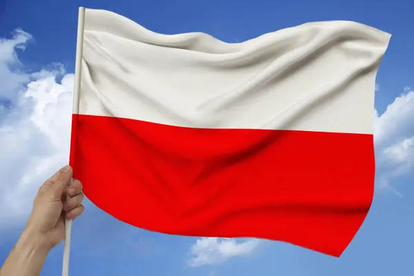 Foto da bela bandeira nacional colorida do estado da Polônia em tecido textural, conceito de turismo, economia e política, close-up — Fotografia de Stock