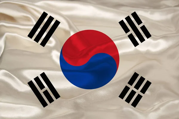 Foto della bella bandiera nazionale colorata dello stato moderno della Corea del Sud su tessuto strutturato, concetto di turismo, emigrazione, economia e politica, primo piano — Foto Stock