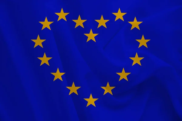 Stylizované vlajky Evropské unie, symbol sjednocené Evropy na měkkém hedvábí s měkkými záhyby, zblízka — Stock fotografie