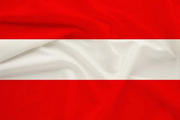 National flag of Austria on delicate silk with wind folds, travel concept, immigration, politics — Stock Photo, Image