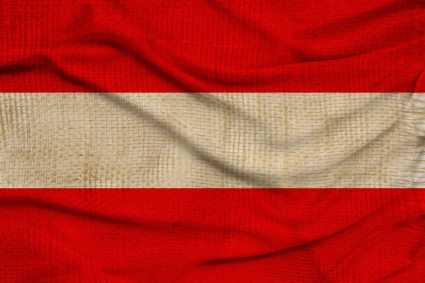 Fotografia da bela bandeira nacional colorida do estado moderno da Áustria em tecido texturizado, conceito de turismo, economia e política, close-up — Fotografia de Stock