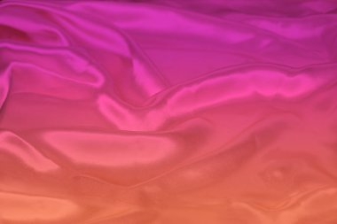 Pembe, mor, üst manzara, yakın çekim, kopyalama alanı olan ipek kumaşın güzel lüks dokusu