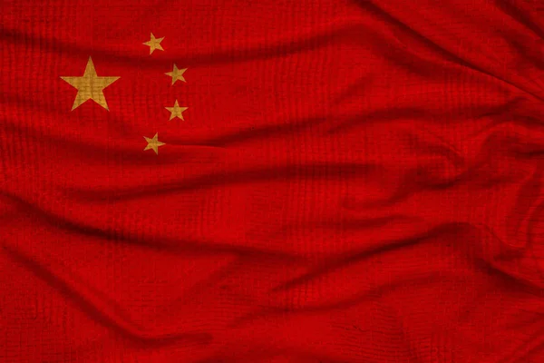 Photo du drapeau national de Chine sur une texture luxueuse de satin, soie avec vagues, plis et faits saillants, gros plan, espace de copie, concept de voyage, économie et politique d'État, illustration — Photo