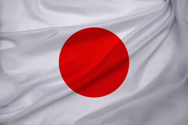 Foto der schönen farbigen Nationalflagge des modernen Staates Japan auf texturiertem Stoff, Konzept Tourismus, Auswanderung, Wirtschaft — Stockfoto