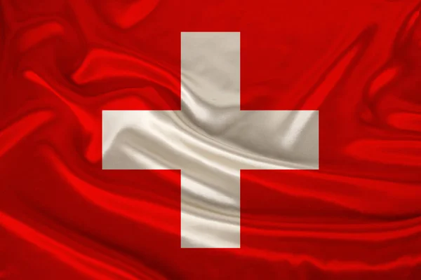 Photo of the national flag of Switzerland on a luxurious texture of satin, silk with waves, folds and highlights, closeup, copy space, travel concept, economy and state policy, illustration — Stock Photo, Image
