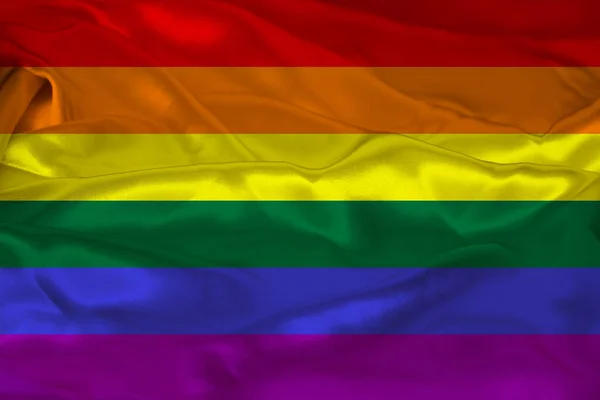 Прапор лука, прапор гордості, прапор свободи - міжнародний символ лесбійської, геївської, бісексуальної та трансгендерної спільноти, концепція руху за права людини — стокове фото