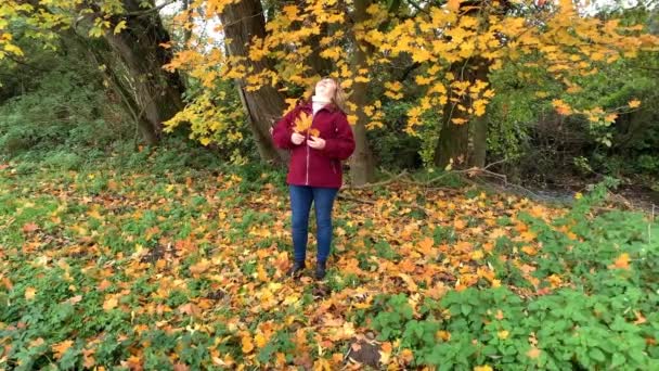 Middle Aged Woman Love Blue Jeans Burgundy Jacket Having Fun — Stock Video