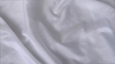 Beyaz renkli güzel ipek kumaş, küçük kıvrımlarla örtülmüş, yumuşak akışlı, lüks, düğün konsepti, doku, arkaplan, bir kart formu, kopyalama alanı