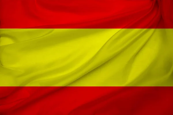 Photo du beau drapeau national coloré de l'État moderne d'Espagne sur un tissu texturé, concept de tourisme, économie et politique, gros plan — Photo
