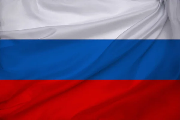 Foto de la hermosa bandera nacional de color del estado moderno de Rusia en tela texturizada, concepto de turismo, emigración, economía an — Foto de Stock