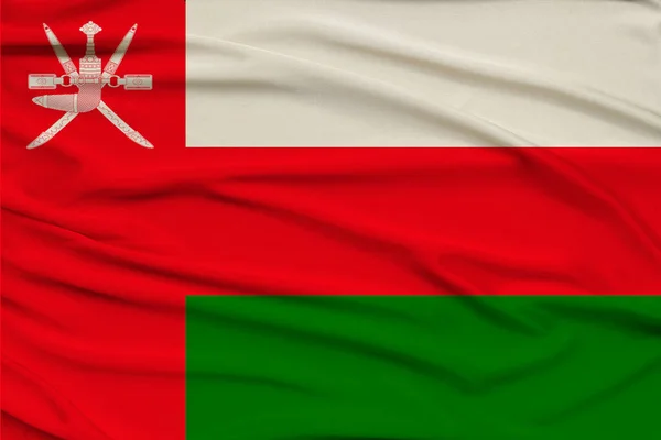 Bandiera nazionale colorata dello stato moderno dell'Oman su un bellissimo tessuto di seta, concetto di turismo, economia, politica, emigrazione, primo piano — Foto Stock