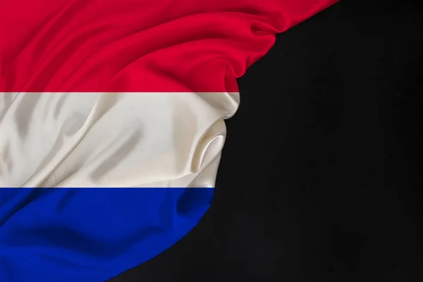 Drapeau national coloré vertical de l'état moderne des Pays-Bas, belle soie, blanc noir, concept de tourisme, économie, politique, émigration, fête de l'indépendance, espace de copie, modèle — Photo