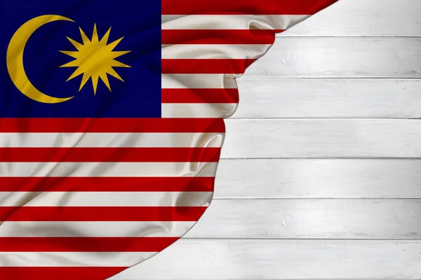 Malásia cor horizontal bandeira nacional do estado moderno, seda bonita, fundo de madeira branca, conceito de turismo, economia, política, emigração, dia da independência, espaço de cópia, modelo — Fotografia de Stock