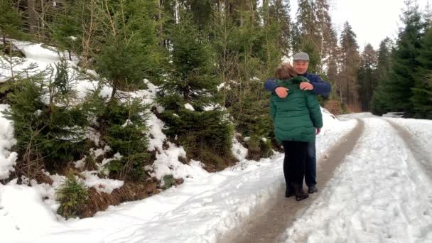 Middle Aged Woman Man Jackets Walk Winter Snowy Forest Hold — 图库视频影像