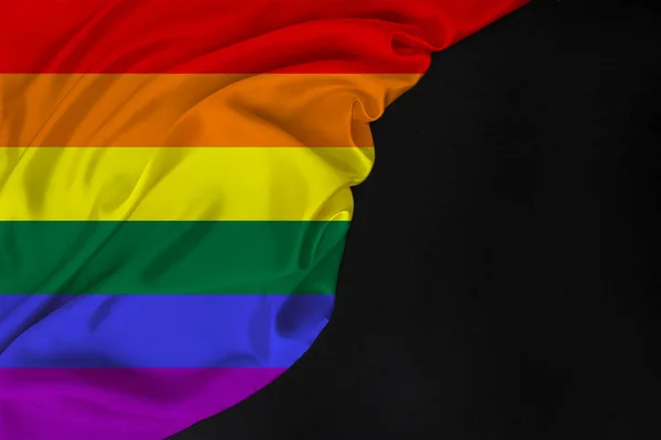 Color LGBT rainbow flag, Pride flag, beautiful silk, black blank, concept of tourism, economy, politics, emigration, independence day, copy space, template, horizontal — 스톡 사진