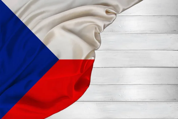 Шовковий національний прапор сучасної країни Чеська Республіка лежить проти білої деревини, концепції туризму, економіки, політики, еміграції — стокове фото