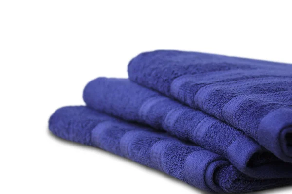 Pile of clean terry bath towels of purple towels, close-up, on a light background, concept of cleanliness, bath procedure, spa — 스톡 사진