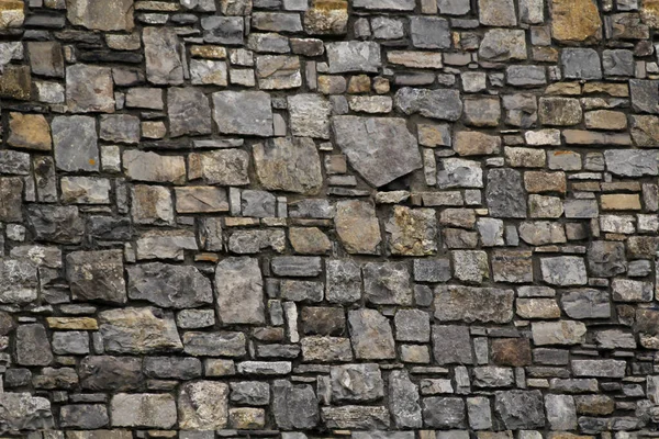 Textura sin costuras de la vieja pared de piedra para el diseñador, fondo áspero —  Fotos de Stock