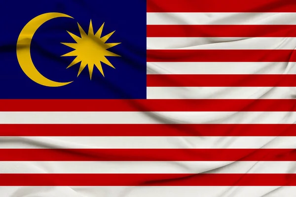 Beautiful photo of the national flag of Malaysia on delicate shiny silk with soft draperies, the concept of state power, country life, horizontal, close-up, copy space — Stock Photo, Image