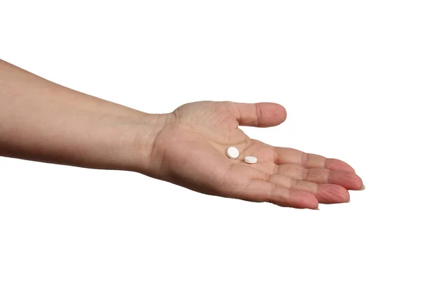 Kvinna Håller Handen Med Två Vita Piller Vit Bakgrund Begreppet — Stockfoto