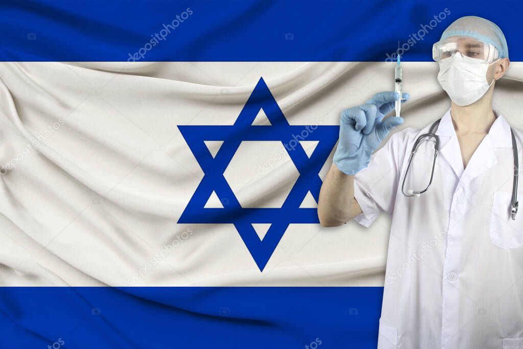 medical syringe for injection in the hands of a doctor against the background of the national flag of israel, concept of SARS virus, COVID-19, coronavirus, epidemic, vaccination