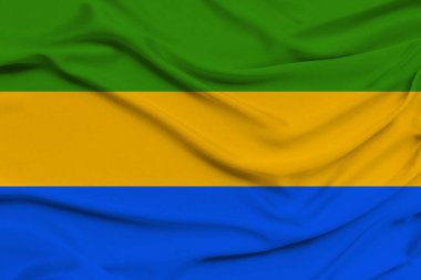 Gabon 'un ulusal bayrağının güzel fotoğrafı narin, parlak ipek kumaşlı, devlet gücü kavramı, kır hayatı.