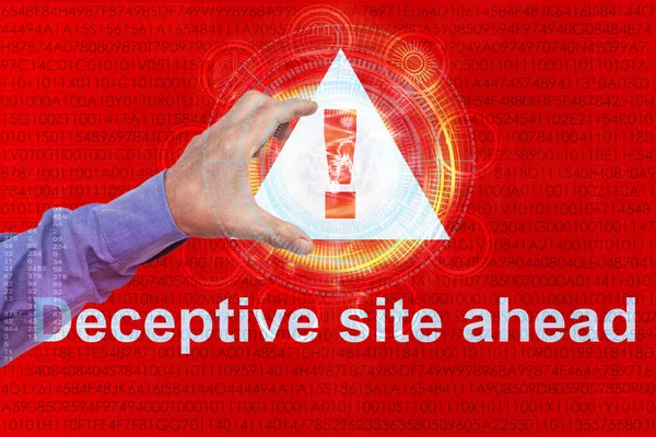 man shows a hand on an exclamation mark on a triangle, concept attention on a red technological background, concept Deceptive site ahead, horizontal, closeup, copy space