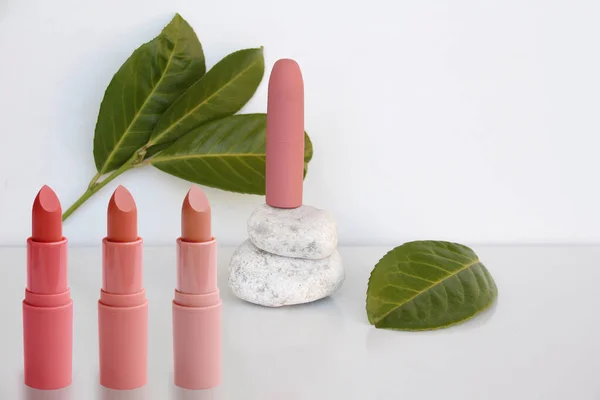 Tube Pink Lipstick Stands Natural White Stones White Background Vibrant — Stock Photo, Image