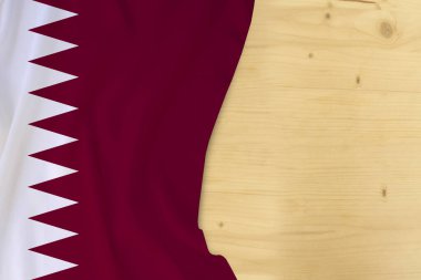Katar 'ın ipek rengi ulusal bayrağı, metin için ahşap boşluk, turizm, seyahat, göç, küresel ticaret, bağımsızlık günü konsepti