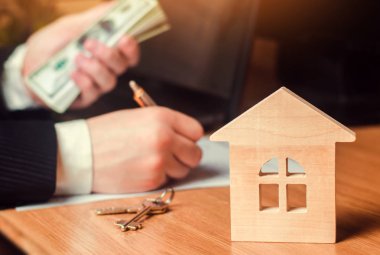 Emlak kavramı. Satılık veya Kiralık Konut Daire Kiralık. emlakçı. bir daire sözleşme imzalama. ipotek kavramı