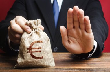 Businessman refuses to give European euro EUR money bag. Refusal to grant loan mortgage, bad credit history. Refuses cooperate. Financial difficulties. Economic sanctions, confiscation funds clipart