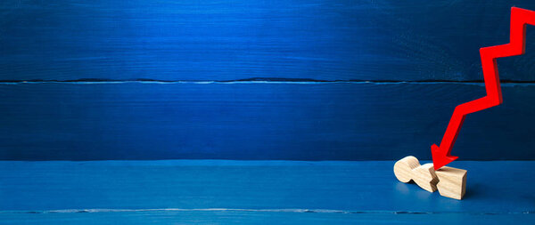 The red arrow cleaves the person. The concept of psychological pressure. Victim of the economic crisis, falling quotations and the collapse of the market. Vulnerable person, defeat. copy space banner