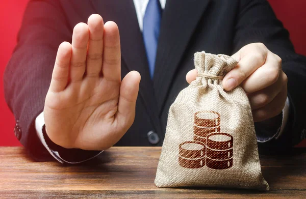 Businessman refuses to give money bag. Refusal to grant loan mortgage, bad credit history. Financial difficulties. Refuses cooperate. Economic sanctions, confiscation funds. Asset freeze seizure — Stock Photo, Image