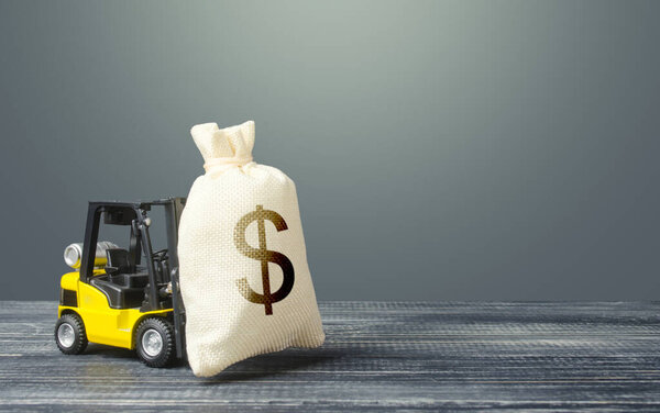 Yellow forklift carries a dollar money bag. Tax payment. Payment of taxes. Big contract, profitable deposit, take a loan. Wealth, investments in economy. financial aid. Inflation, price increases