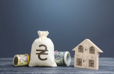 Ukrayna para çantası ve bulmaca evi. Konut kooperatif üyeliği. Devlet sosyal programları. İpotek kredisi, bina bakımı ve kamu hizmetleri giderleri. Özellik değeri