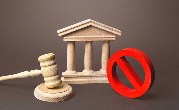 Courthouse and red prohibition sign NO. Implementation of laws restrictions and prohibition. Fines and penalties for rules violations. Unpopular laws, restriction of rights and freedoms. Lack justice