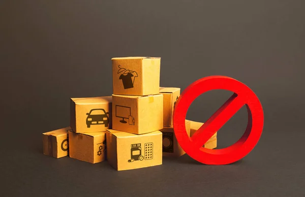 Cardboard boxes and red prohibition symbol NO. Import restriction, ban export goods. Lack of goods, deficit shortage, Out of stock. Embargo sanctions, trade wars. Border closure, quarantine isolation
