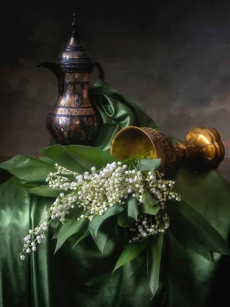 Still life with a bouquet lily of the valley