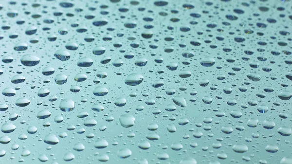 Druppels Water Een Glazen Oppervlak — Stockfoto